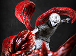 Statue of a character with red hair and white outfit, surrounded by red snakes, on a dark background with 'FIGURAMA' branding. Tokyo Ghoul Kaneki kagune texture detail statue
